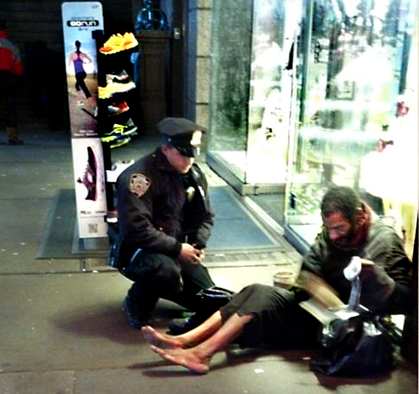 Jennifer Foster's cell phone image of Officer Lawrence DePrimo and a homeless man on Times Square